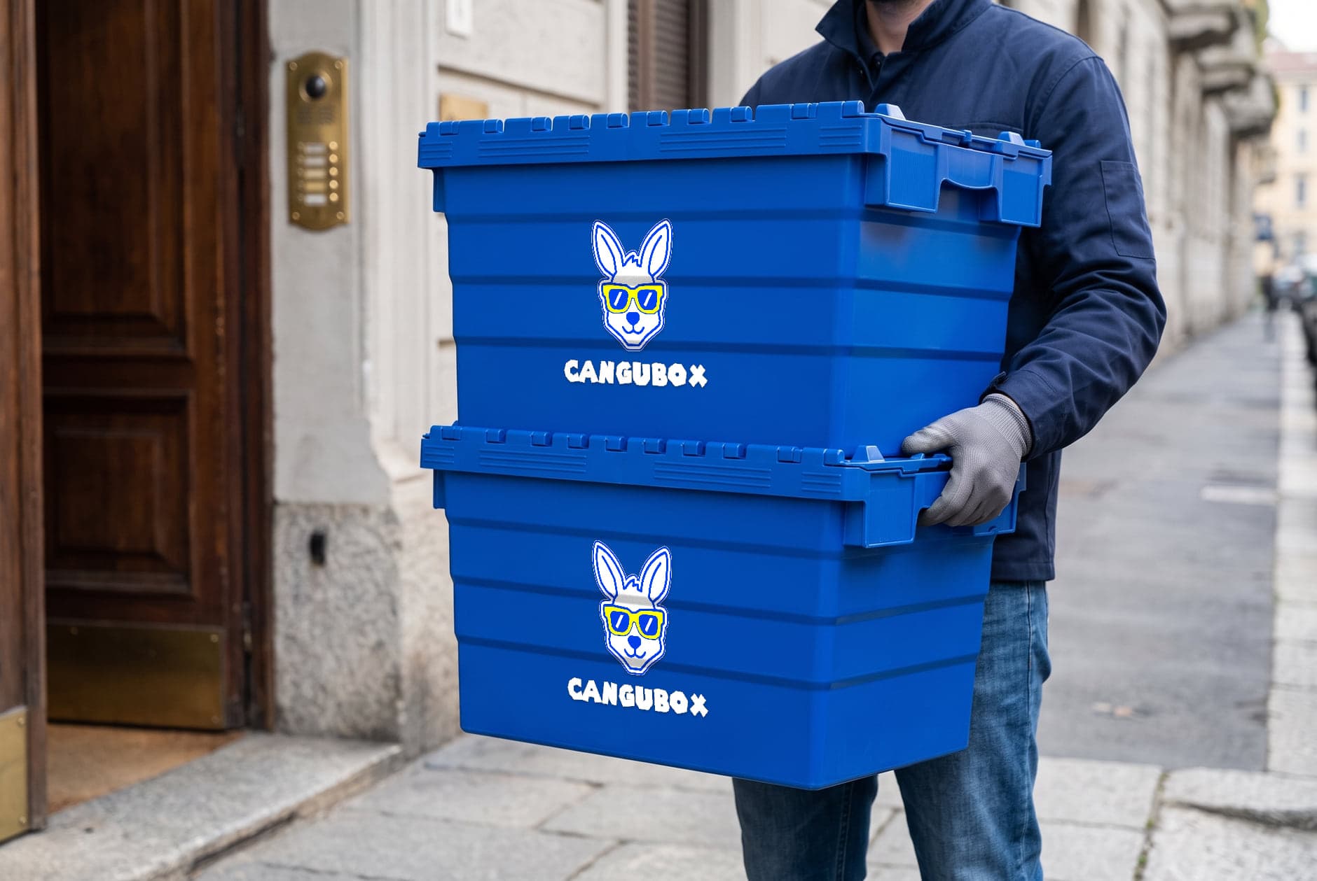 A courier carrying two stacked Cangubox towards the front door of a building